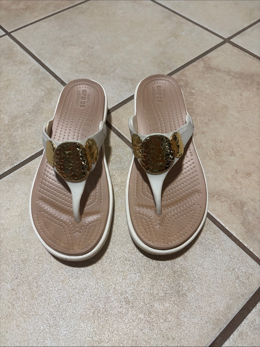 CROCS Women’s White Thong Sandal with Gold Medallion